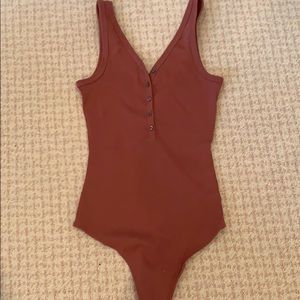 Maroon body suit